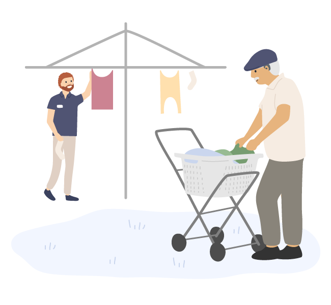 man hanging clothes on rack