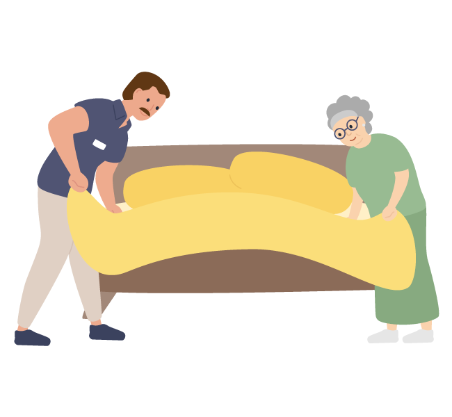 woman and support worker making bed