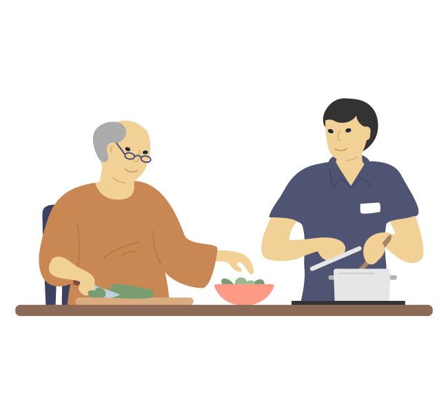 man cooking with support worker
