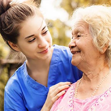 Image showing aged care worker and smiling resident